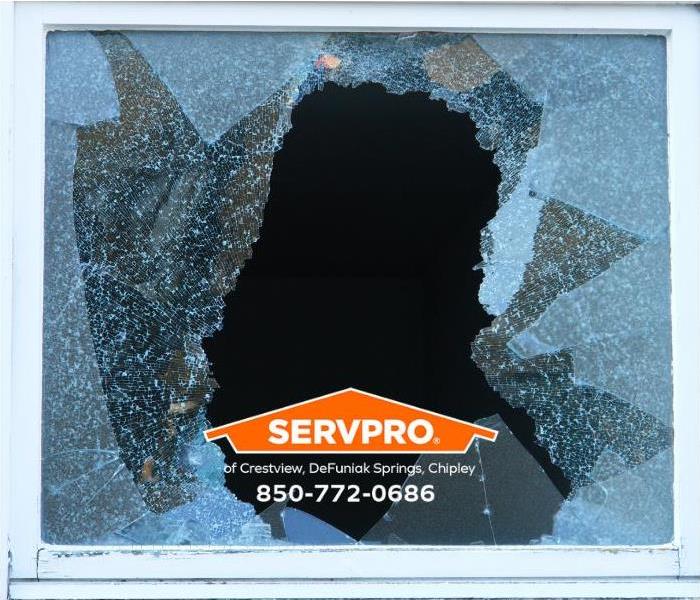 A broken window is shown.
